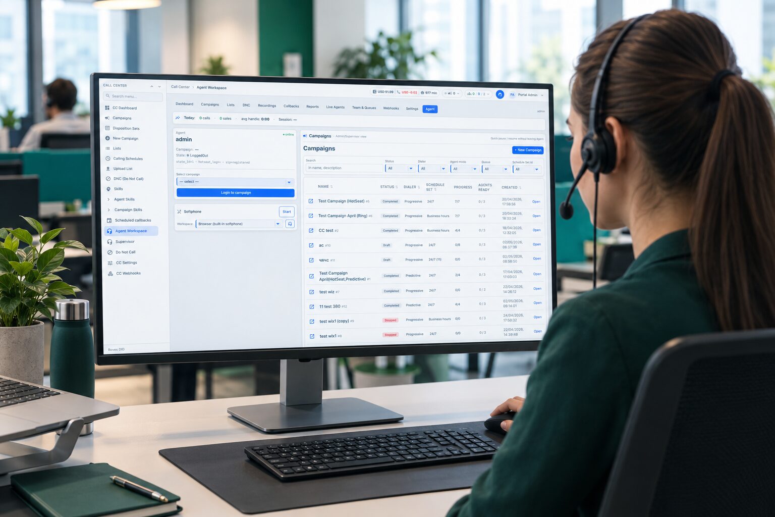 A call-center agent in a headset works at a monitor showing the Pyfone agent workspace with a list of campaigns